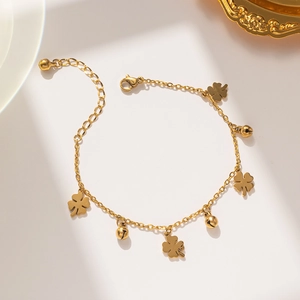 Golden clover bracelet made of titanium steel with small bells for women