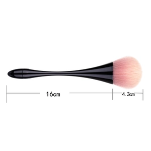 Detail of 16cm makeup brush with soft pink bristles and black hourglass handle