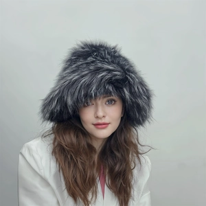 Detailed view of thick dark grey faux fur texture on a punk style winter hat