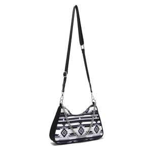 Close-up of black and white Aztec geometric pattern on women hobo bag with metal chain
