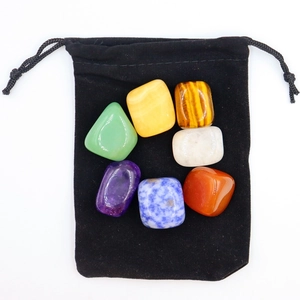 Polished natural seven-color crystal stones set with a black velvet pouch