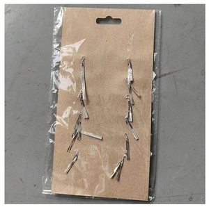 Silver tassel drop earrings displayed in clear OPP plastic bag with kraft paper card