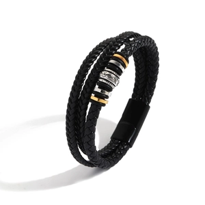 Multi-layer black braided leather bracelet with vintage engraved metal rings and magnetic clasp