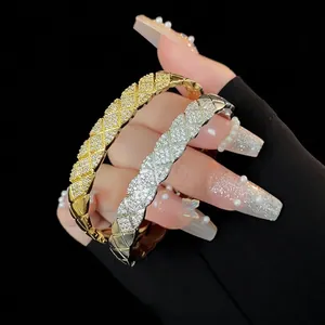 Quilted zircon cuff bracelet in gold and silver plating with shimmering crystal accents