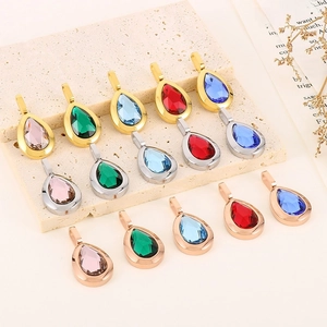 Detailed arrangement of teardrop crystal pendants in colorful metallic settings