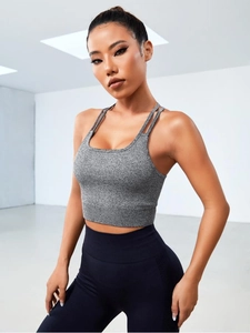 Détail du soutien-gorge de sport gris côtelé et legging de yoga sans couture bleu marine