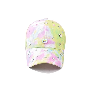 Close-up of tie-dye baseball cap featuring colorful rhinestones and sapphire gems