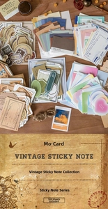 Close-up of vintage scrapbook paper set including 100 sheets of retro memo pads