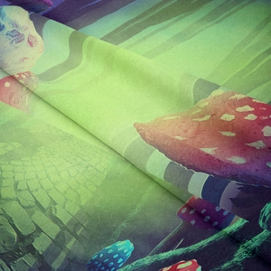 Close-up of bohemian mushroom forest tapestry showing detailed fabric texture and print