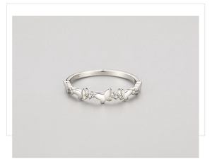 Macro shot of S925 sterling silver butterfly ring with micro-set cubic zirconia stones