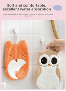 Detail of coral fleece hand towel showing soft texture and high absorption features