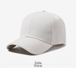 Detail view of the stitching and twill cotton fabric on a beige baseball cap