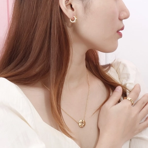Golden jewelry set featuring my love letter necklace and zircon stud earrings on model