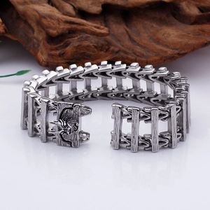 Macro view of vintage dragon bone titanium steel bracelet with antique silver finish details