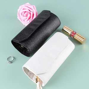 Portable folding PU leather jewelry roll organizer in black and white finishes