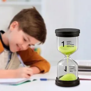 Green sand hourglass timer with black caps for kids' 1-minute time management and study focus