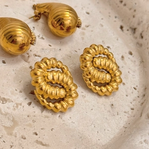 18k gold plated vintage snake twist and teardrop earring set on stone display