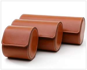 Three-piece brown leather watch roll set with contrast white stitching details