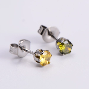Classic French style silver cubic zirconia stud earrings with yellow round gemstones