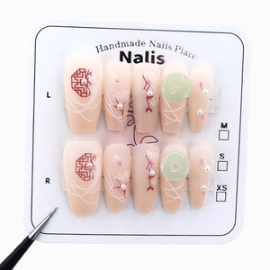 Handmade press-on nails set with pink matte finish and Chinese floral art style