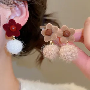 Retro velvet flower earrings with fluffy pom poms and pearl accents in autumn style