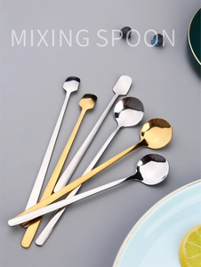 Set of gold and silver long handle stainless steel mixing spoons with square and round heads