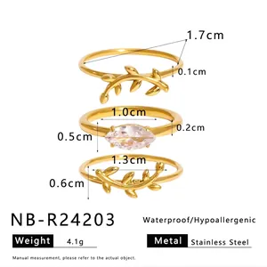 Macro shot detailing dimensions and materials of hypoallergenic gold stainless steel rings