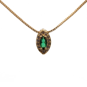 Elegant gold necklace with emerald-shaped green gemstone pendant and diamond halo on white