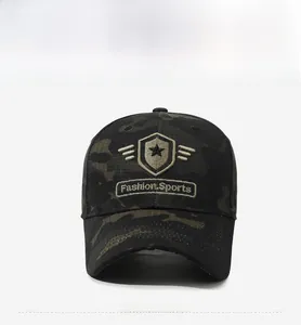 Close-up of camouflage baseball cap with detailed embroidery and shield logo