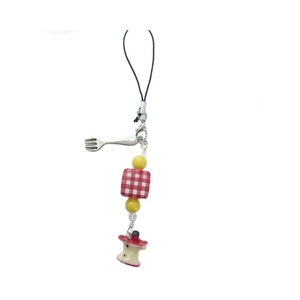 Handmade beaded phone charm with apple pendant and silver fork charm on white background