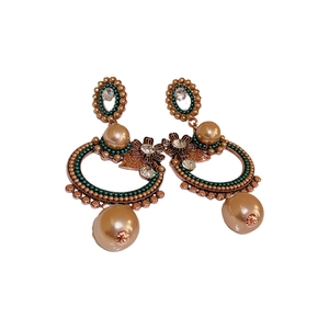 Vintage bronze floral earrings with green beads, pearls and crystals on white background