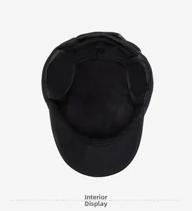 Detail view of the warm fleece lining and earflap design inside this men's winter flat cap