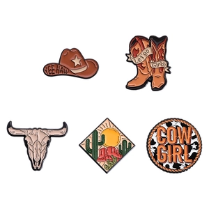 5-piece western cowboy enamel pin set with boots, hat, and bull skull on white backdrop