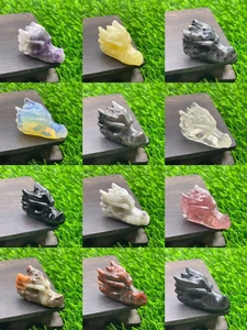 Collection of 1.5-inch hand-carved natural gemstone dragon heads in 12 assorted crystals