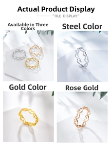 Detailed view of hollow heart rings in silver, gold, and rose gold stainless steel colors
