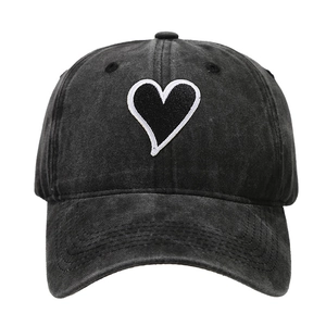 Vintage washed charcoal baseball cap featuring a heart embroidery patch on the front