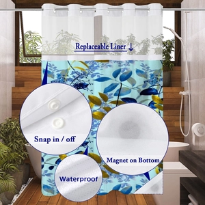 Detail view of tropical leaf shower curtain with snap-in liner and weighted magnets
