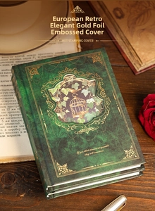 Detail of vintage notebook with green hot stamping cover and hollow window design