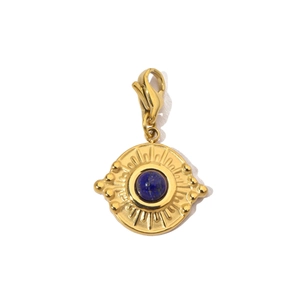 Detail of gold sun pendant with blue natural stone and lobster clasp on white background