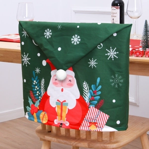 Green Christmas chair cover featuring cartoon Santa Claus and a white plush pom-pom