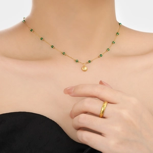 French retro gold shell necklace with green emerald beads on stainless steel chain