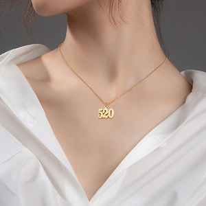 Elegant 18k gold plated stainless steel necklace with 520 pendant on female model