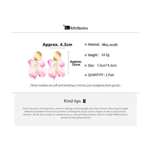 Detail showing acrylic petal earrings with pink gradient and product dimensions