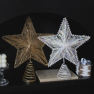 Sparkling Christmas tree star topper in gold glitter and white laser with a spiral base