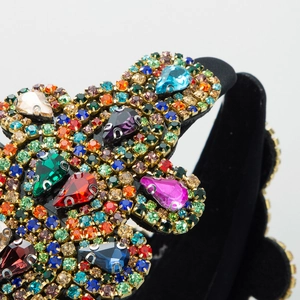 Luxurious velvet headband with colorful rhinestones and gold metal claw settings