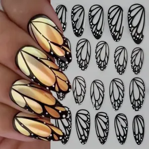 Detailed view of STZ-X059 gold gradient butterfly wing nail stickers with black outlines