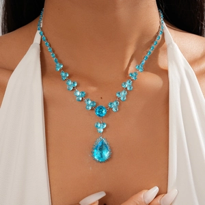 Detail of light luxury blue zircon flower necklace with a large teardrop pendant