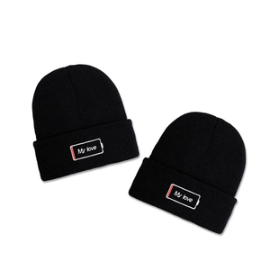 Set of two black knitted beanies with battery embroidery and My Love text detail