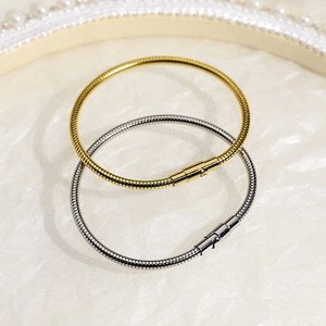 Sleek gold and silver snake chain bracelets in polished stainless steel with push buckles