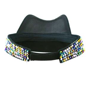 Detail of black sun visor hat featuring rows of colorful rhinestones on the brim